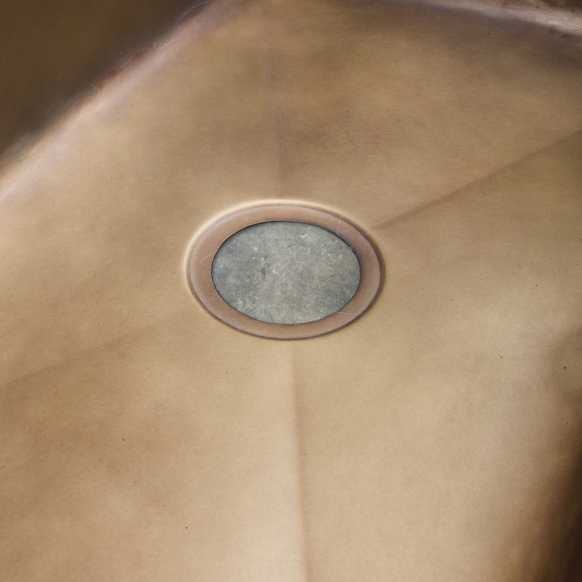 brass patina on a sink detail shot