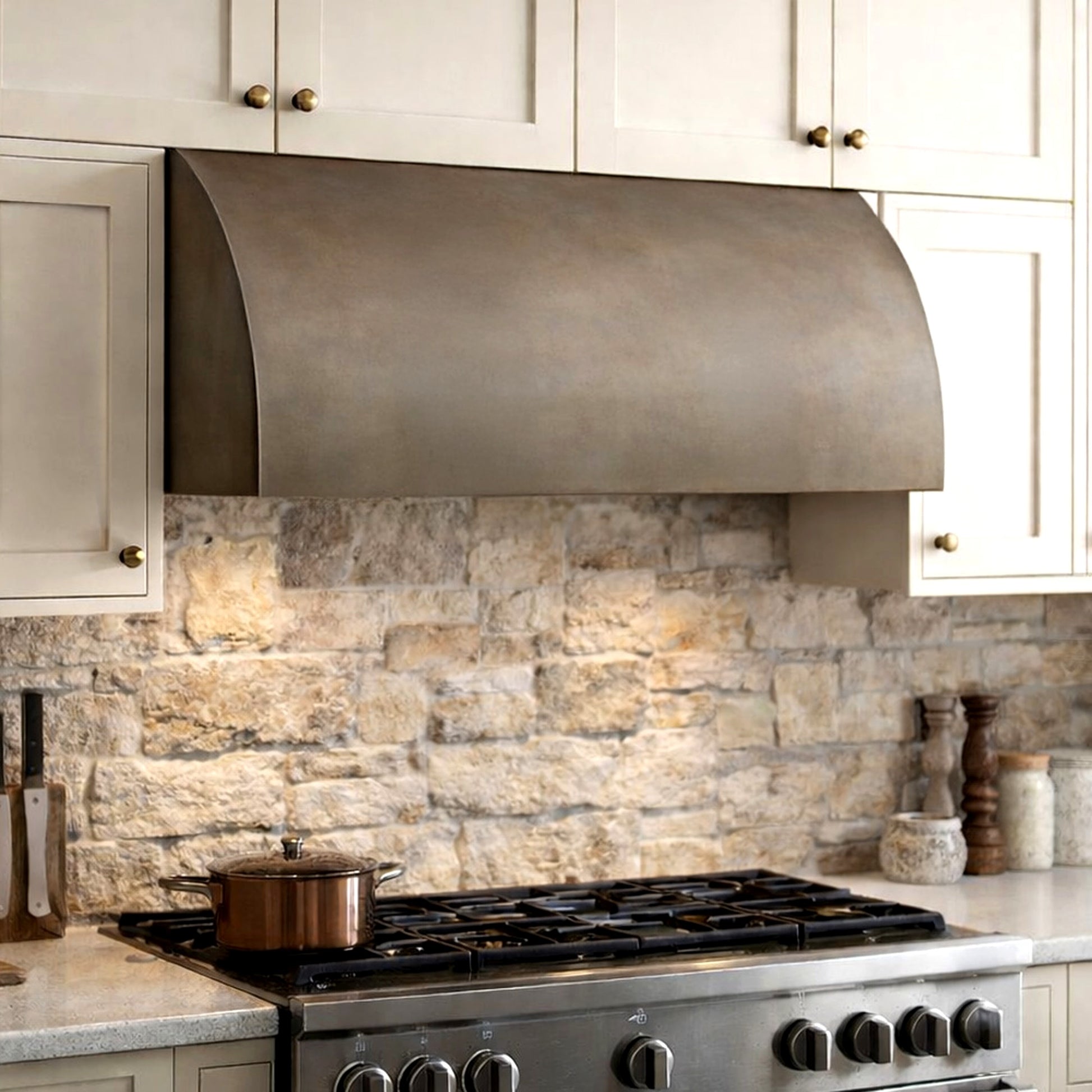 antique steel under cabinet range hood in modern rustic kitchen