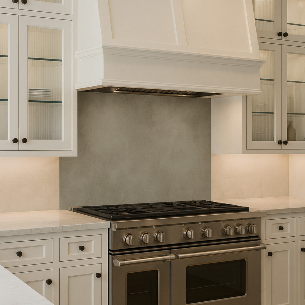 metal backsplash in a white traditional kitchen