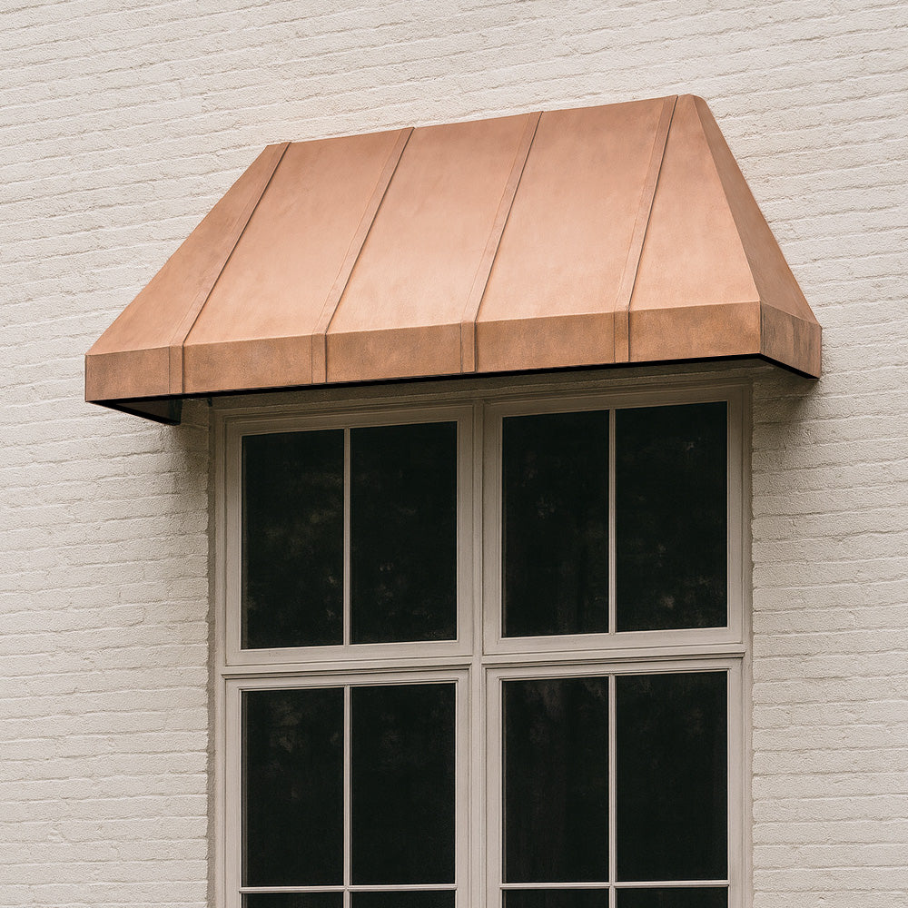 Architectural metal window awning adding depth and character to exterior facade.