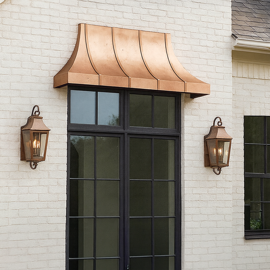 custom copper awning on white brick over a black door