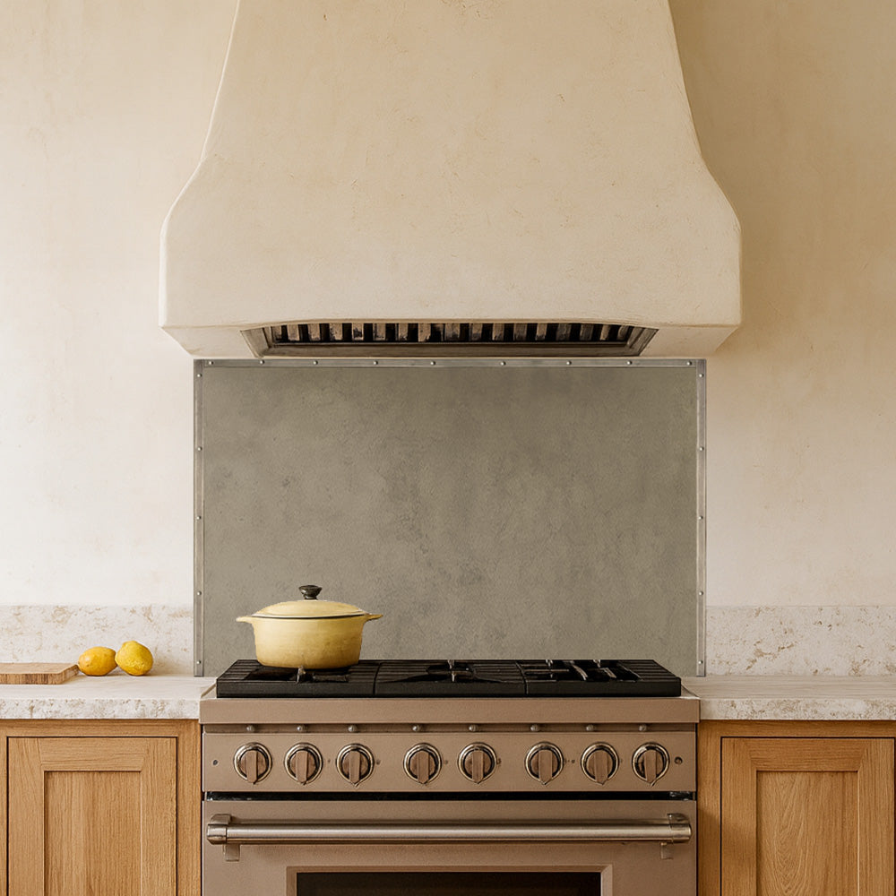high end kitchen with zinc backsplash and rustic elements