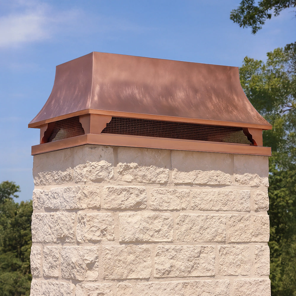 quality Copper chimney cap on a high end stone chimney