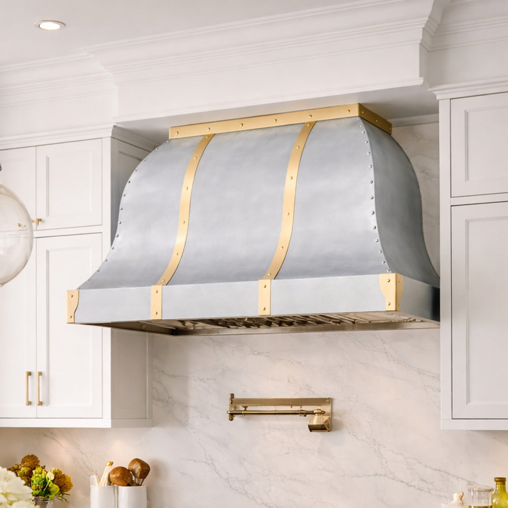bell shaped vent hood in zinc with brass trim